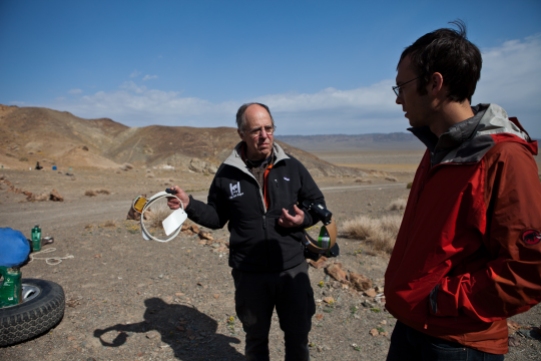 Bear expert Harry Reynolds demonstrates shows the GPS collars they hope to fit on Gobi Bears.