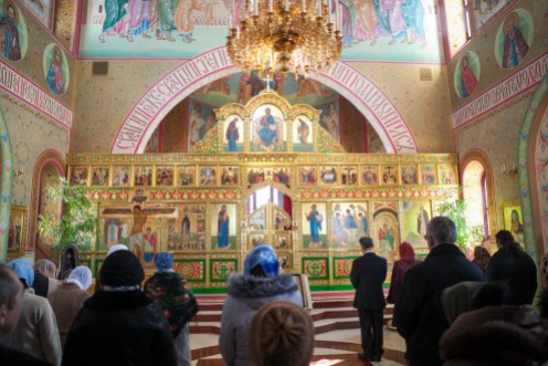Believers gather at the Holy Trinity Parish of the Russian Orthodox Church for Sunday service.