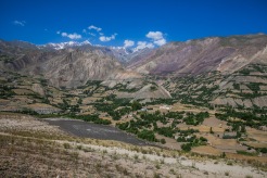 Around 250km of the Pamir Highway runs right along the Panj River that demarcates the border with Afghanistan allowing travellers a view across the border into Afghan villages and a peek of the Hindu Kush mountain range.