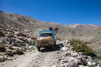 Sturdy Soviet trucks and jeeps, apart form our bicycles, are the only vehicles that can survive the rough remote jeep trials of the Pamirs.