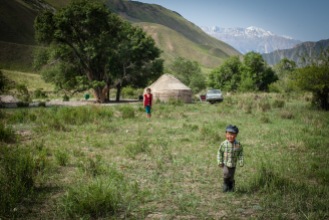Semi-nomadic Kyrgyz herders who move with their yurts and children to their summer pastures would often invite us to camp beside them.