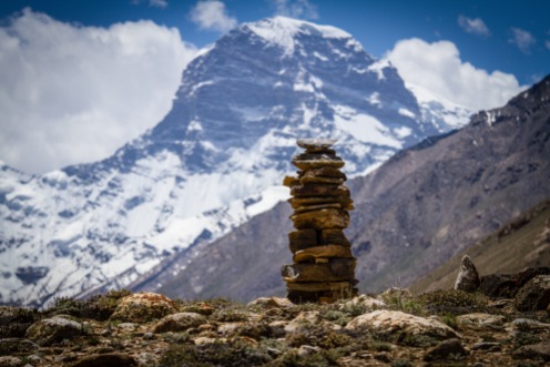 A view of the 6510m high Mt. Engels behind the cairn. Most Soviet-era names have been replaced by newer more nation state symbolic titles but Mt. Engles and Karl Marx peak tucked away in the little visited Shokh Dara Valley retain their communist names.
